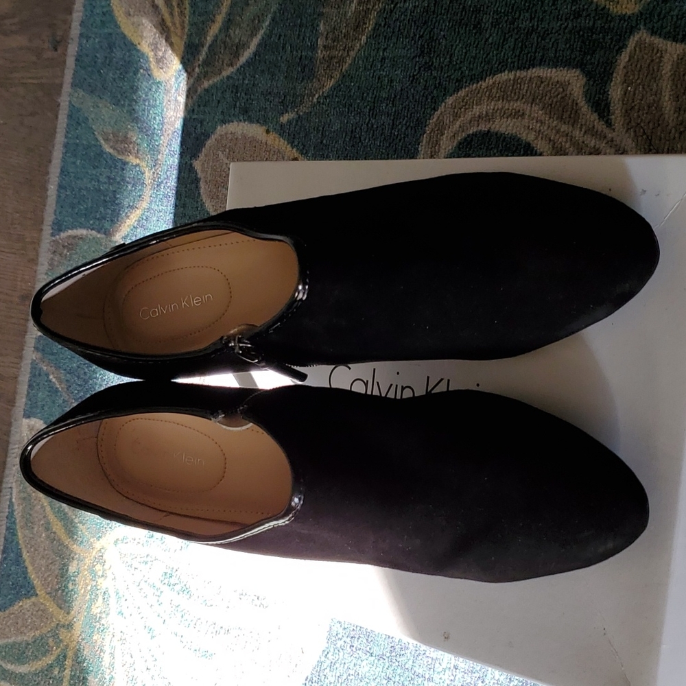 Black Calvin Klein booties